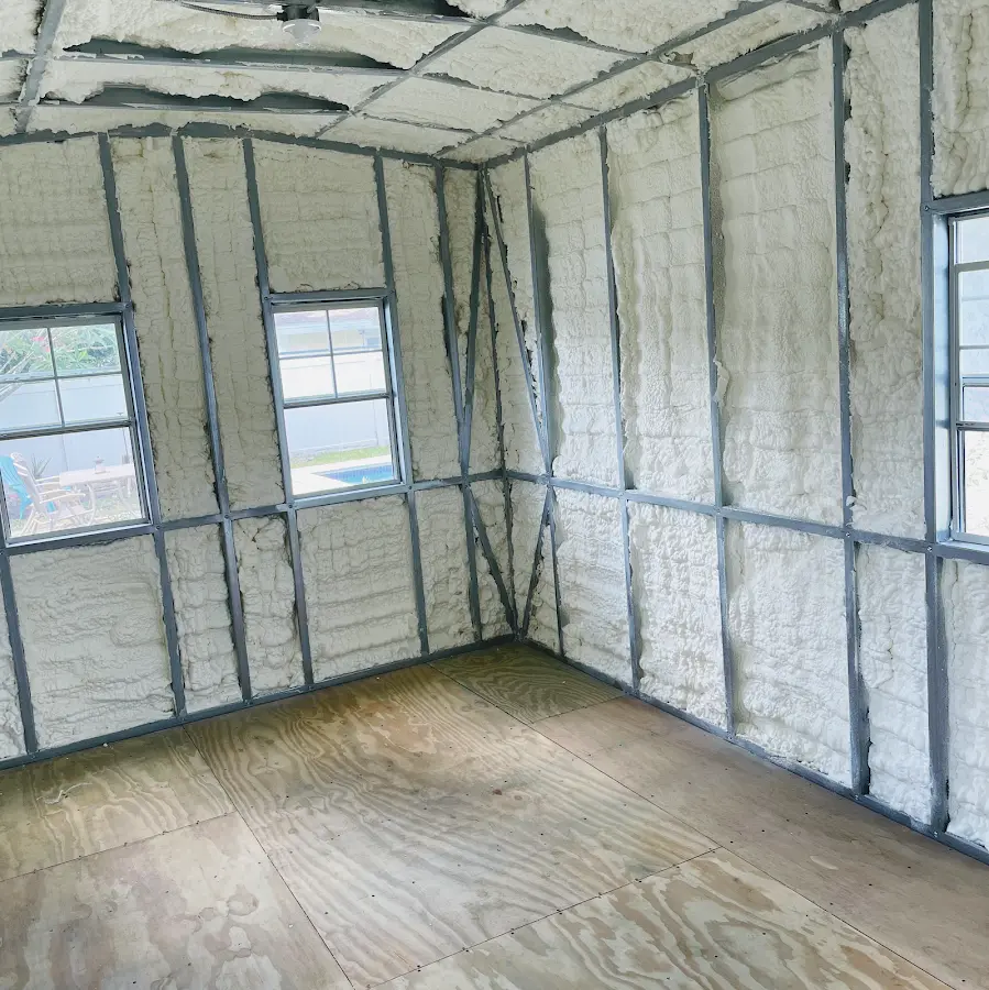 Closed-cell spray foam insulation applied to wall cavities in a residential project in Spanaway